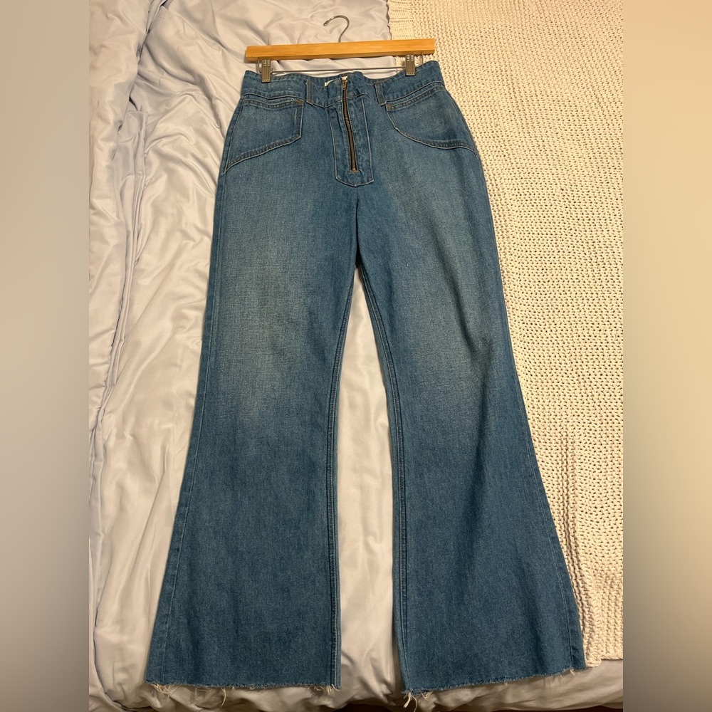 Mid-to-dark wash bootcut jeans from Reformation.